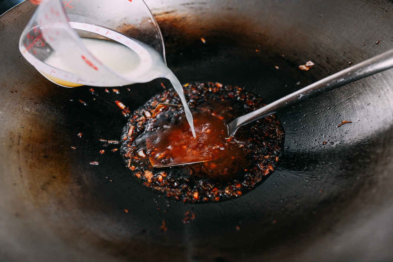 Adding chicken stock to char siu bao sauce