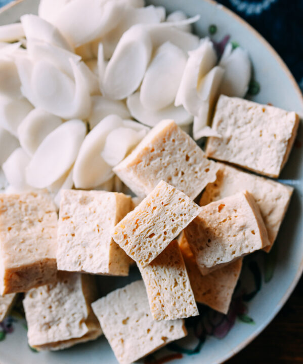 Frozen tofu with rice cakes on plate for hot pot