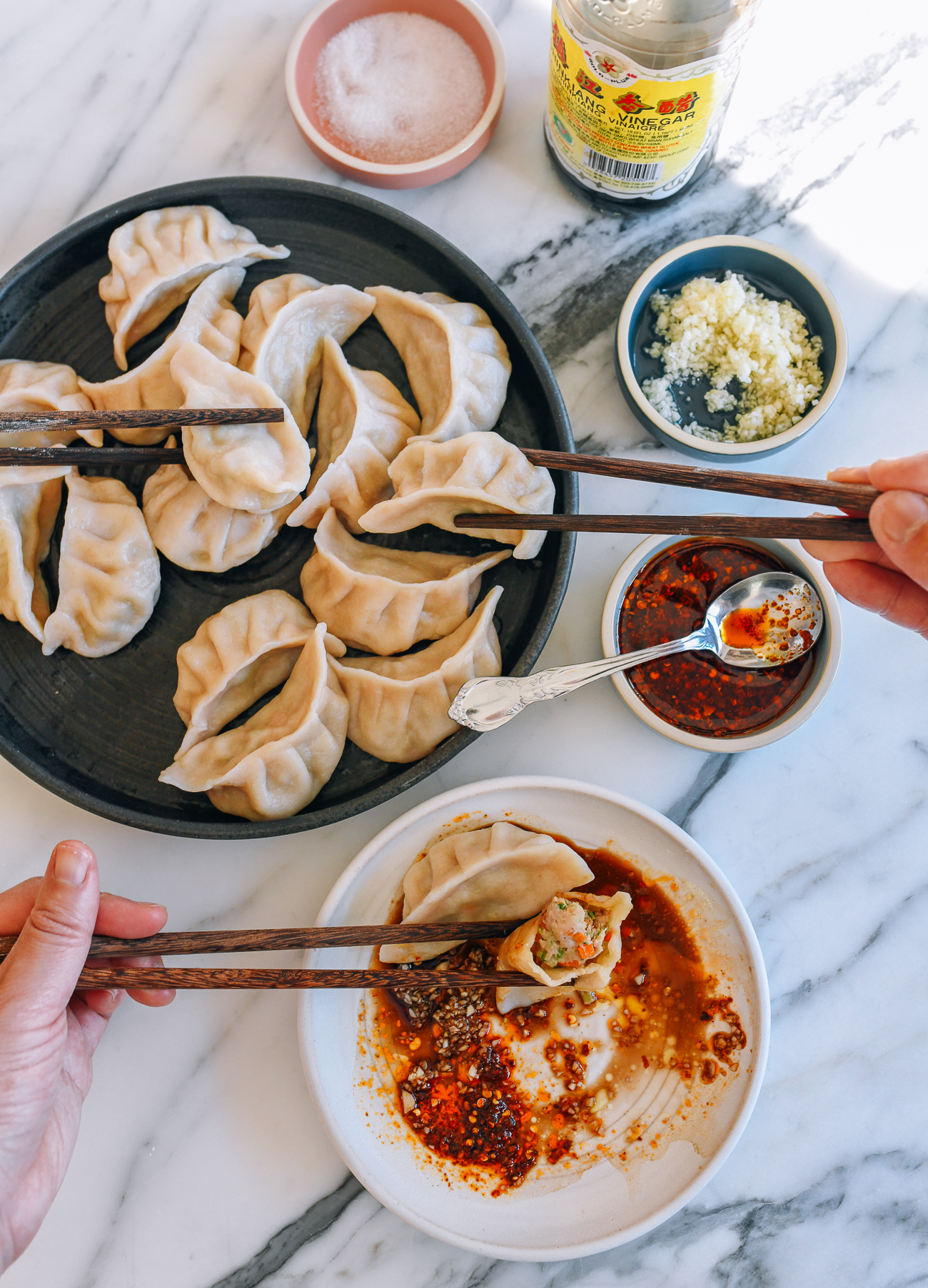 Eating pork and celery dumplings