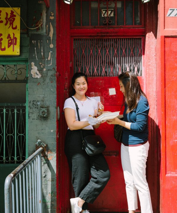 Sarah and Judy eating in Chinatown