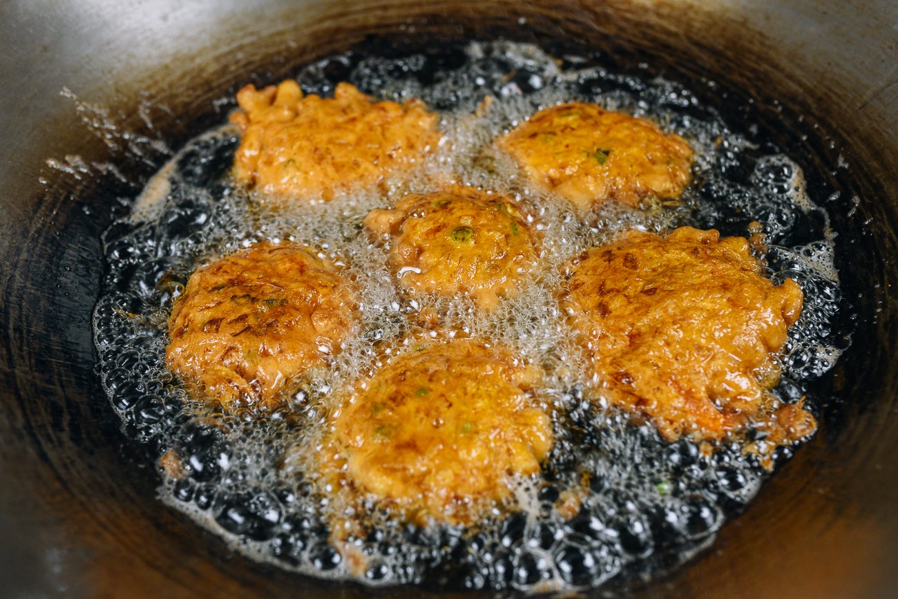 flipped egg foo young patties in hot oil