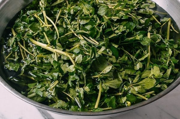 washed watercress in colander