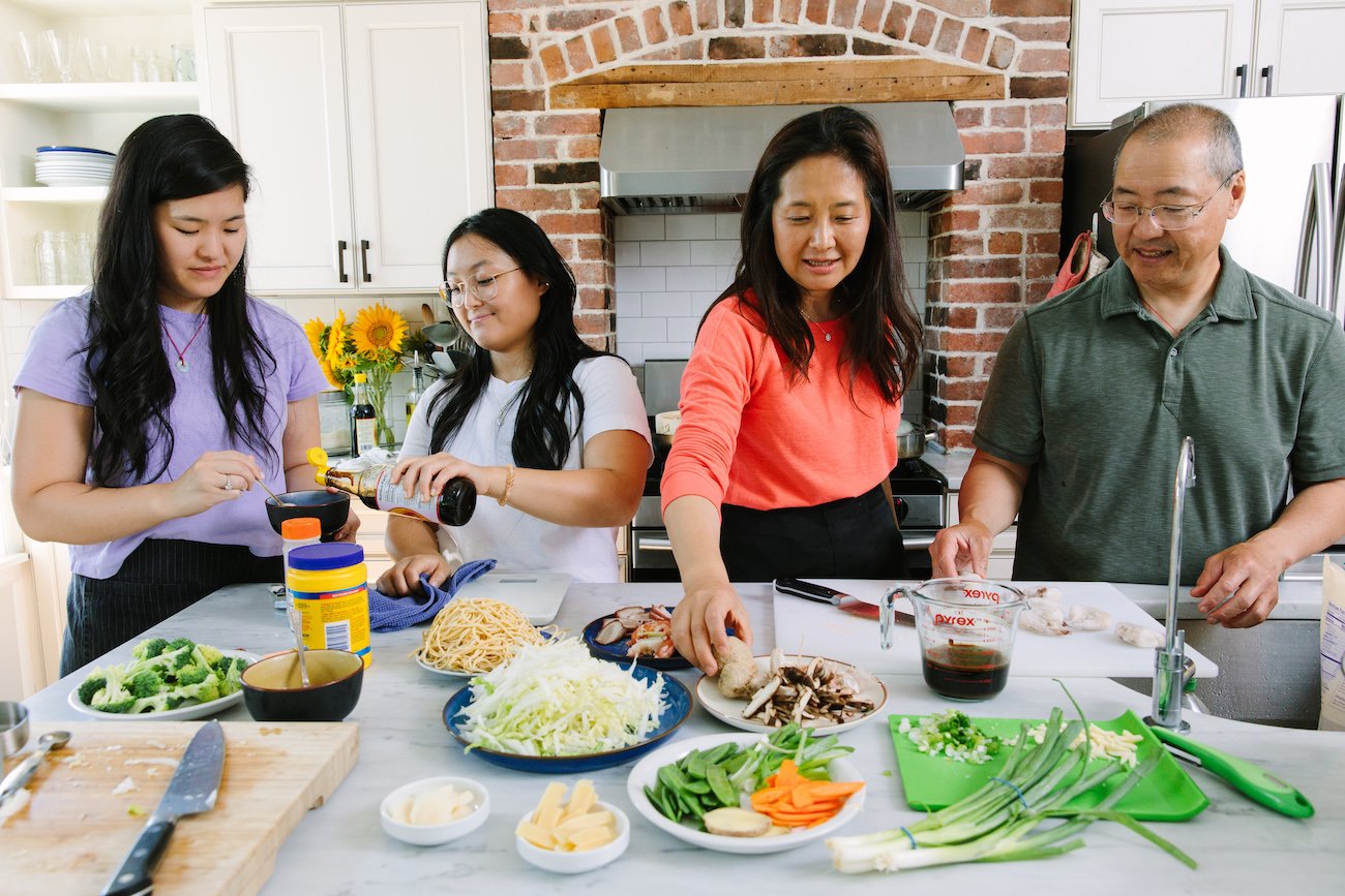 Sarah, Kaitlin, Judy, and Bill cooking together