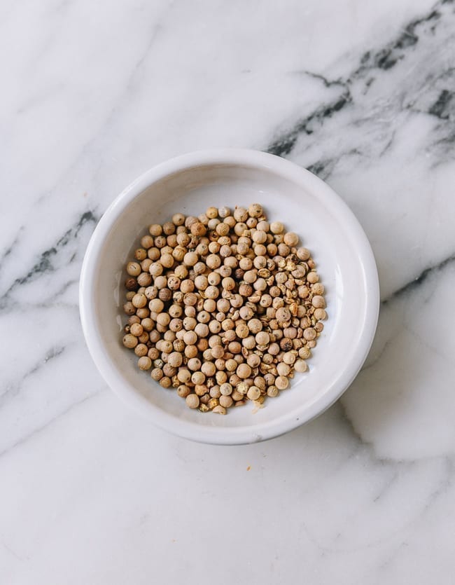 White peppercorns in small bowl, thewoksoflife.com